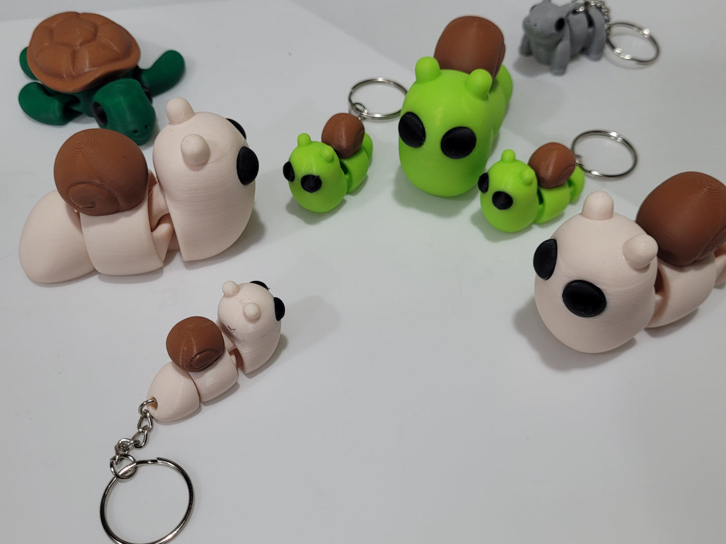Articulated Tiny Snail fidget and keychain from Zou3D