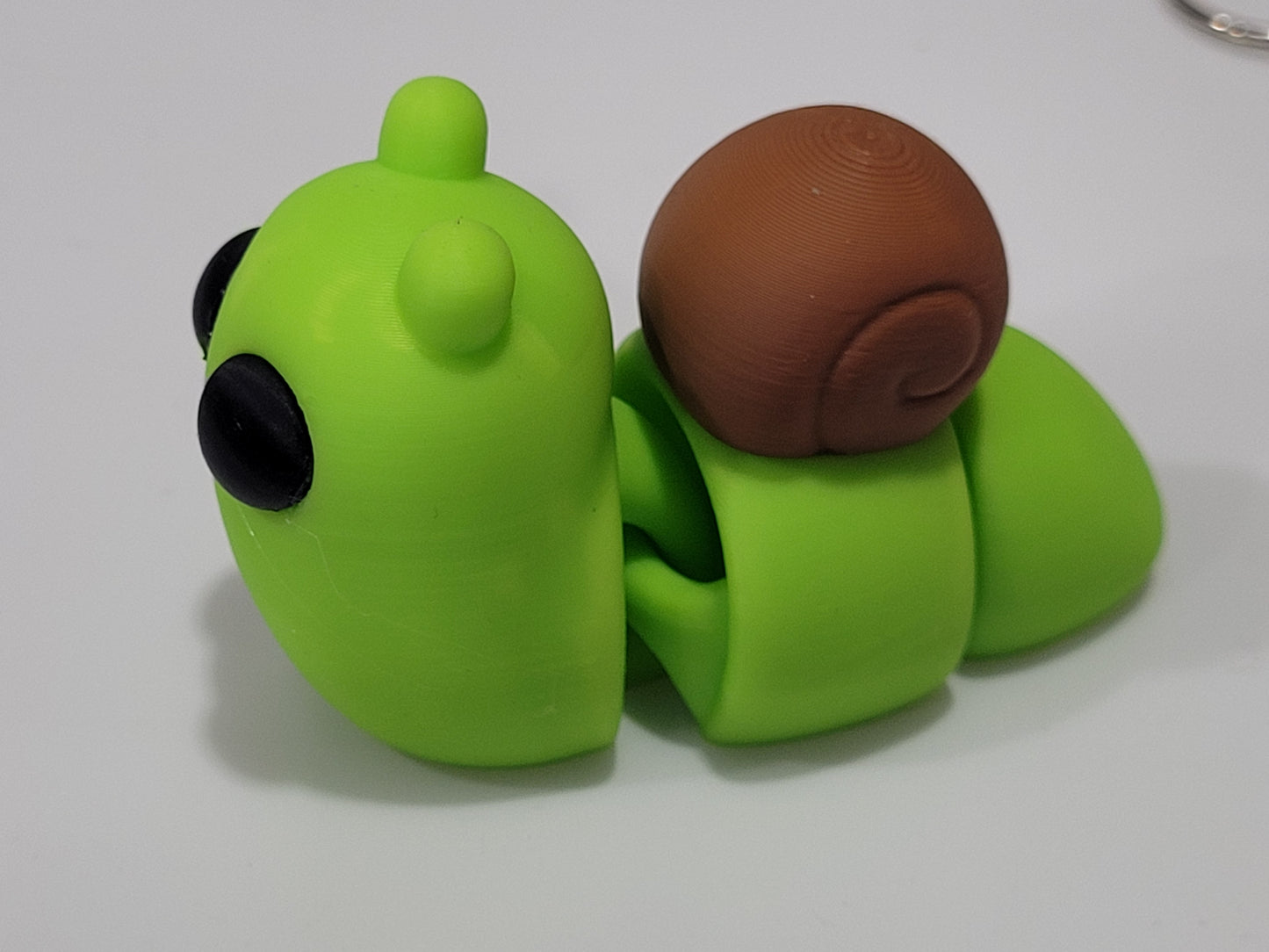 Articulated Tiny Snail fidget and keychain from Zou3D